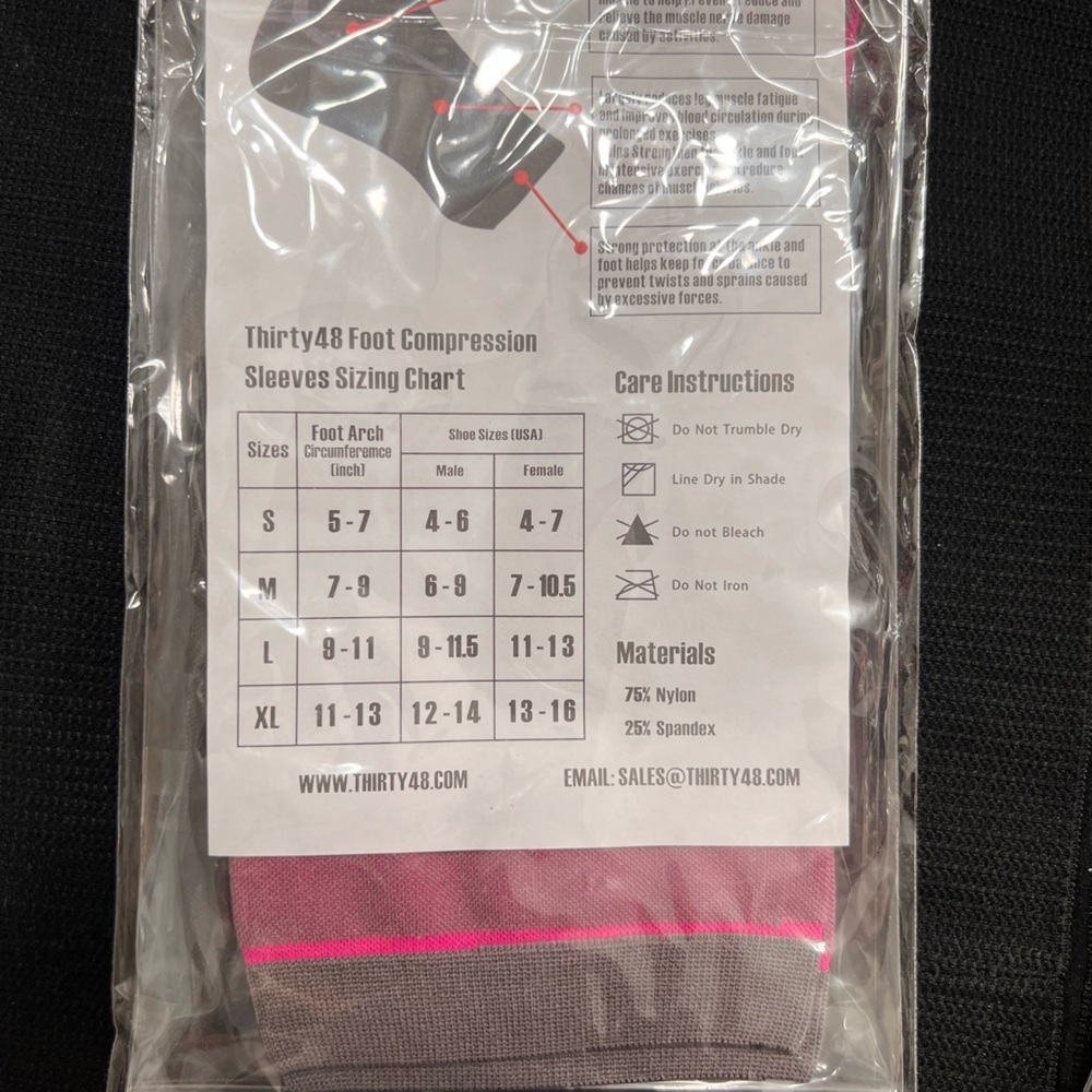 Plantar fasciitis compression socks 2 pair in the bag black and pink.